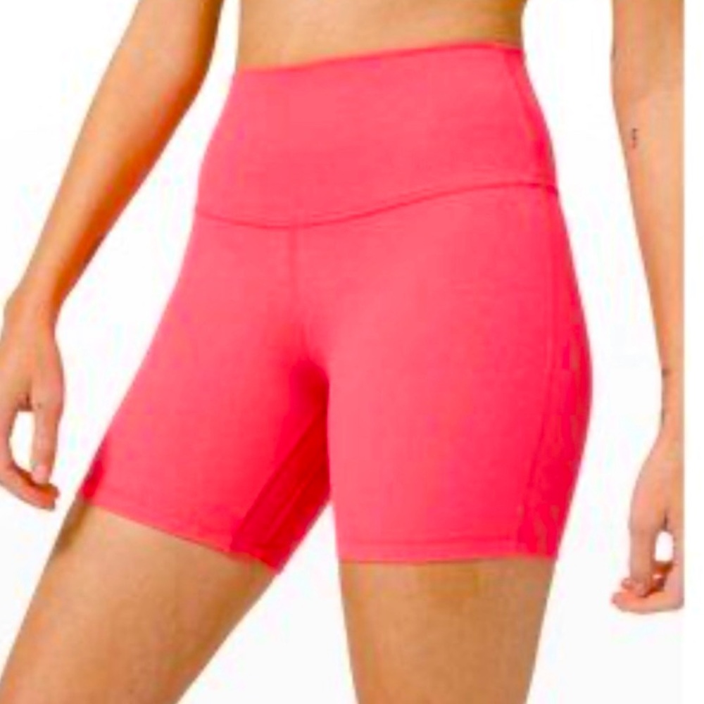 Lululemon bike shorts.  4 inch, size 4. Pink.